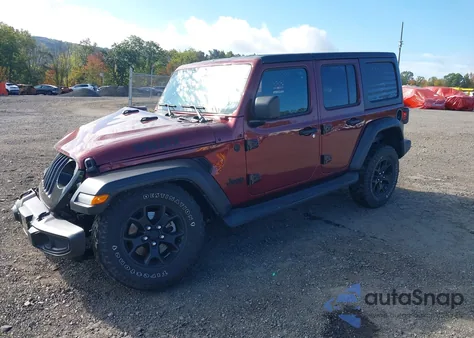 2022 Jeep Wrangler Unlimited Willys 4X4 z USA, uszkodzony, nr VIN 1C4HJXDG4NW154537
